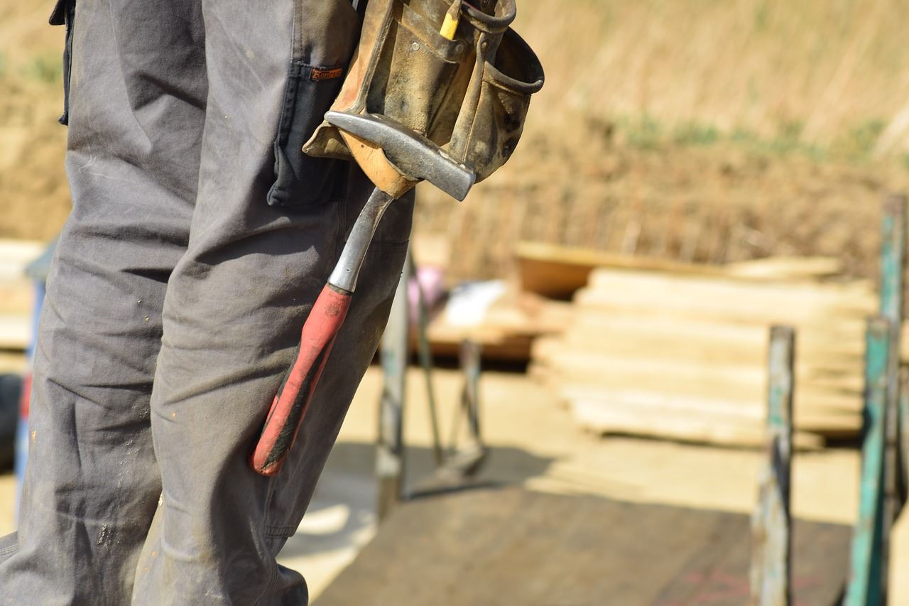 photo of a person wearing a tool belt
