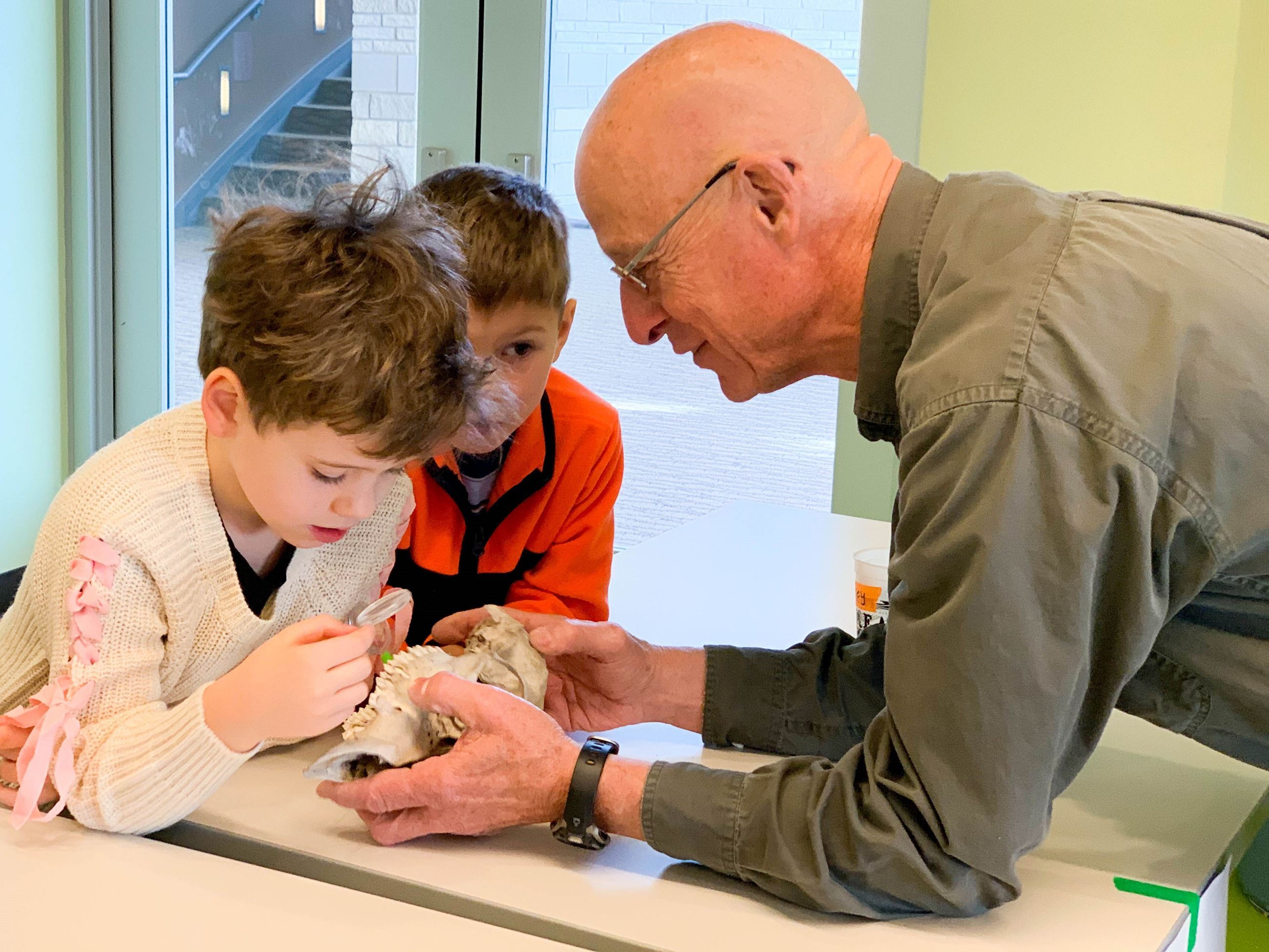 Man volunteering with children